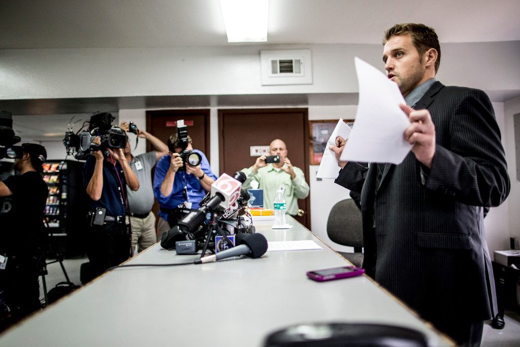 9/30/15 3:58:40 PM -- Oklahoma  Department of Corrections spokesman Alex Gerszewski announces a stay of execution granted by Mary Fallin at the media center inside the Oklahoma State Penitentiary in McAlester, Oklahoma on the day of Richard Glossip's execution.  Photo by Shane Bevel/The Frontier