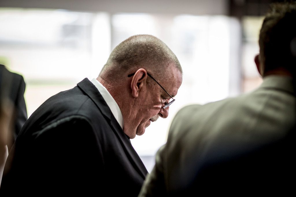 9/30/15 4:23:38 PM -- Department of Corrections Director Robert Patton leaves the media center after speaking briefly about the stay of execution issued for Richard Glossip after it was found out that the state didn't have the correct drug. Photo by Shane Bevel/The Frontier