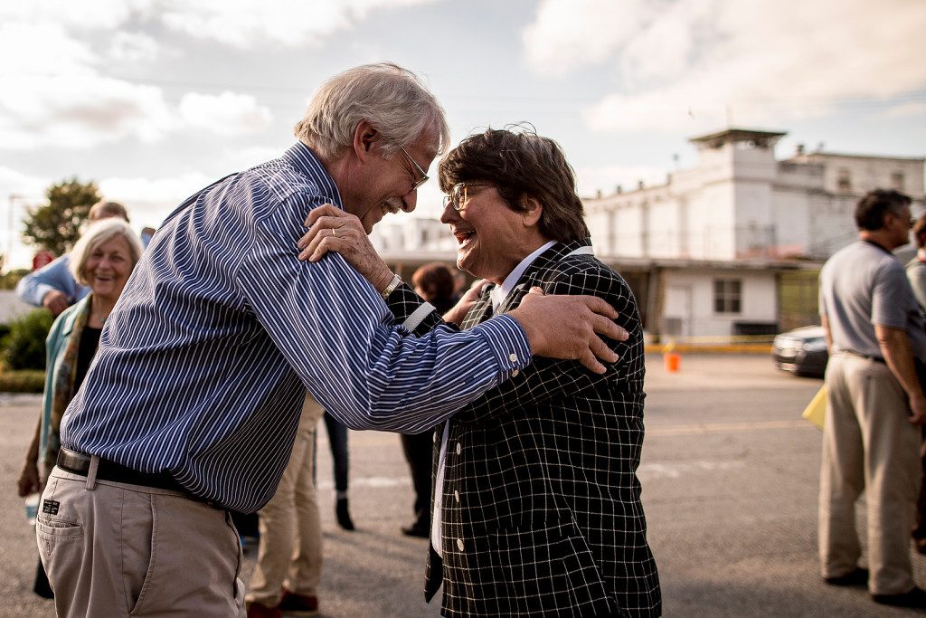 9/30/15 4:41:48 PM -- Kim Van Atta and Sister Helen Prejean celebrate after finding out that a stay of execution had been issued for Richard Glossip because the state didn't have the correct drug. Photo by Shane Bevel/The Frontier